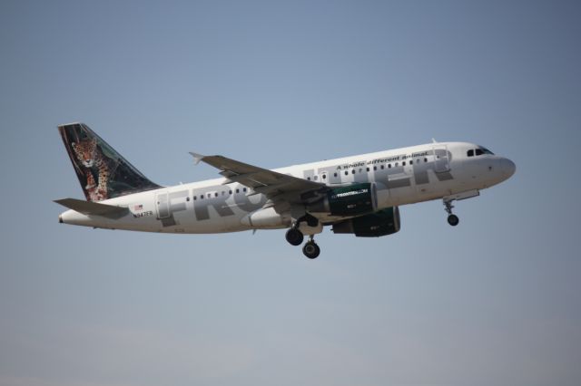 Airbus A319 (N947FR) - Taking off on runway 25.