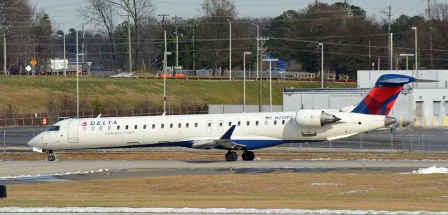 Canadair Regional Jet CRJ-900 (N232PQ) - Overlook. Taxiing to runway 18C.