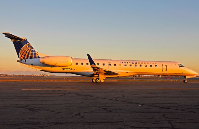 Embraer ERJ-145 (N12201) - Sunset taxi for UAX E145 to the midwest  mother hub