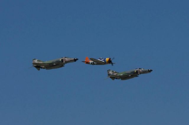 — — - Two McDonnell Douglas F-4 Phantoms with Republic Aviation's P-47 Thunderbolt at Little Rock Air Force Base in Jacksonville, AR.