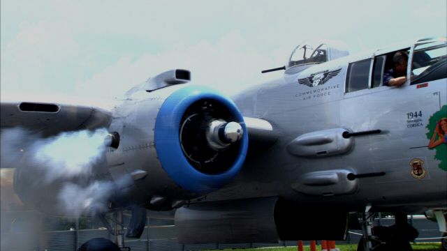 North American TB-25 Mitchell (N125AZ) - Maid in The Shade, a restored B-25J with 15 WW II combat missions (with 319th Bomb Group, November 1944) roars to life at The Aviation Museum of Kentucky.... shes visiting thru the weekend; static displays until Friday, rides begin Friday...