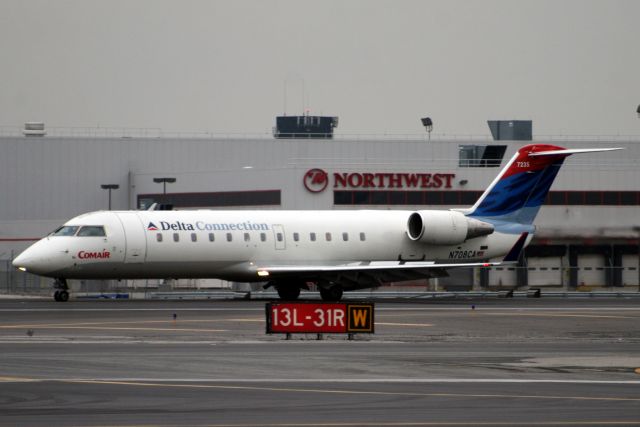 Canadair Regional Jet CRJ-100 (N708CA) - Landing on rwy 31R on 14-Nov-06.  Registration cancelled 3-Feb-12.  Broken up at KTUS.