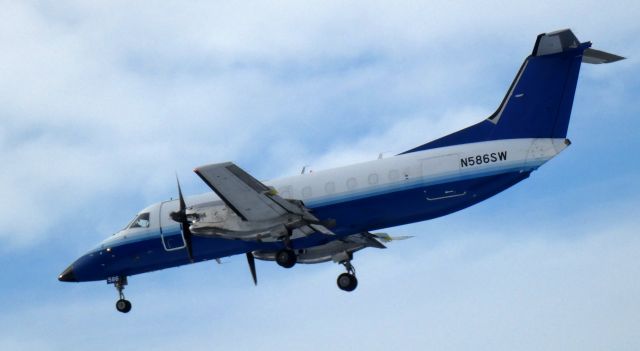 Embraer EMB-120 Brasilia (N586SW) - On final is this 1999 Embraer EMB-120ER Brasilia in the WInter of 2020.