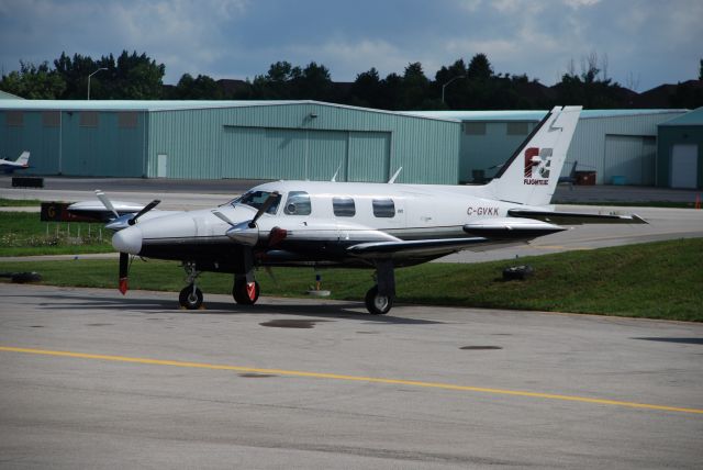 Piper Cheyenne 2 (C-GVKK) - Piper Cheyenne of Flight Exec parked on the ramp at Buttonville Airport Toronto, on August 2/08.  They also operate a C560, a new Challenger and 4 Falcon 10s,   plus several Cheyennes.