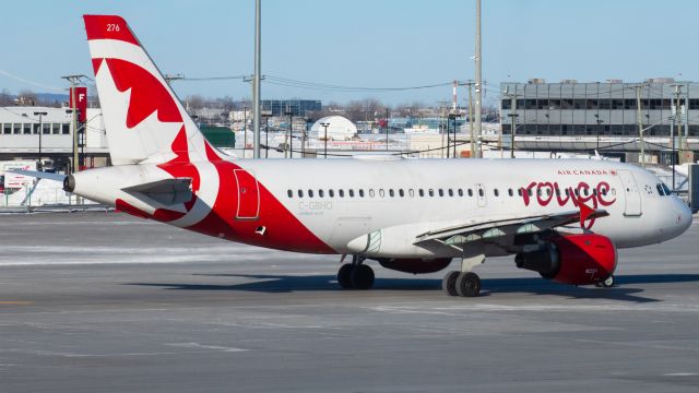 Airbus A319 (C-GBHO) - An Air Canada Rouge A319 taxis to the runway.