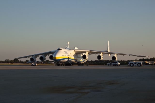 Antonov An-225 Mriya (UR-82060) - #3 engine problems, aircraft missed its 18:45 departure time.Notice the ladder under the #3 engine and its cowlings are open. Update: Just after 19:00, a crew member put covers on the pitot tubes. At about 23:20, aircraft was dark and no activity was noted. Tomorrow is another day, comrades.