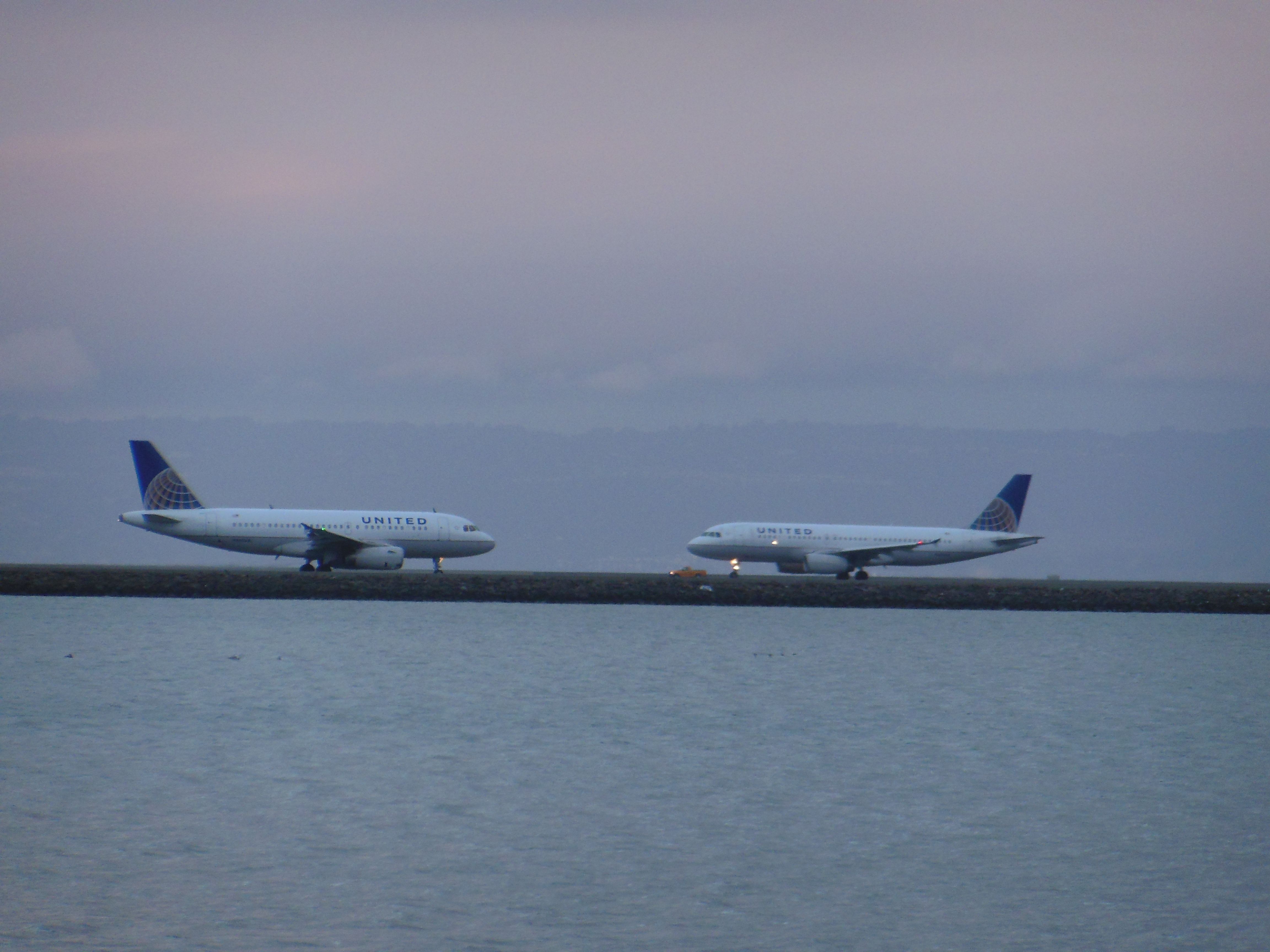 Airbus A319 — - The twins reunite! Sorry for bad quality, just a 14 year-old photographer on a low budget. 