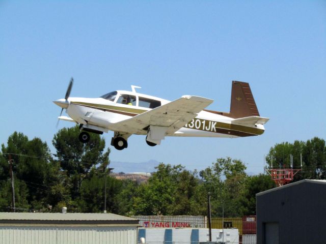 Mooney M-20 (N301JK) - Taking off RWY 24