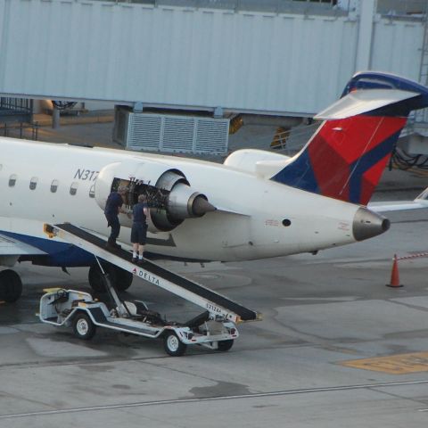 Canadair Regional Jet CRJ-200 (N317CA) - check engine light must of been on ;)