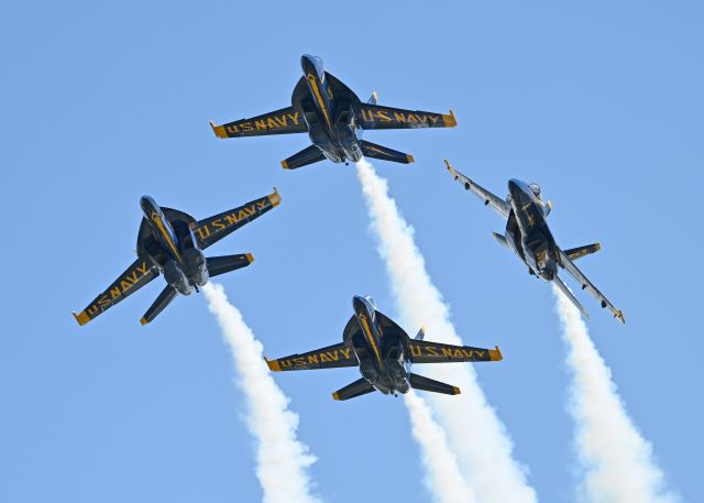 — — - The Blue Angels performed at Melbourne, Florida on May 15th & 16th.  This photo catches planes 2 and 3 breaking from the diamond formation.  This is one of my favorite photos of all time!