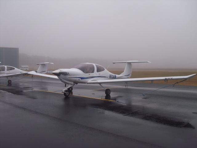 Diamond Star (N673AM) - Extremely foggy outside at the Falcon Aviation Academy open house.http://faa-air.com/