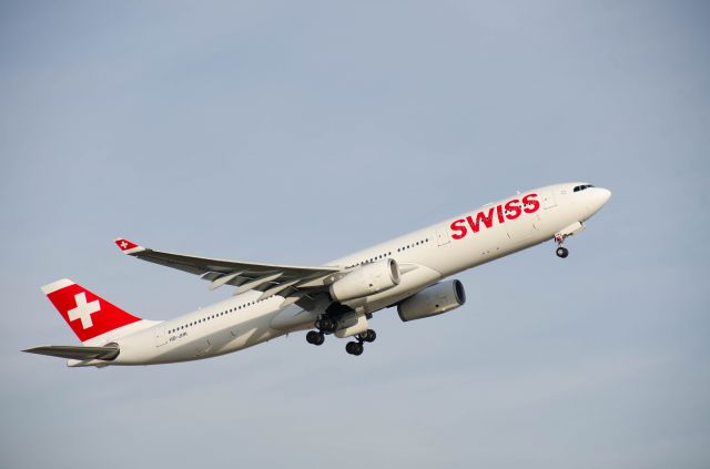 Airbus A330-300 (HB-JHK) - Waiting at the heliport during preflight inspection at about 13:45, got a nice view of this A330 taking off.