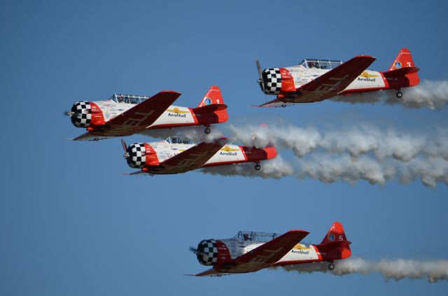 North American T-6 Texan — - EAA 2011 Aeroshell Team performing.