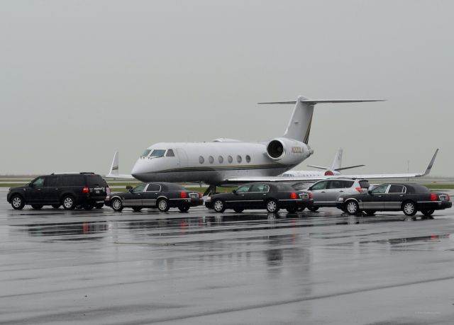 Gulfstream Aerospace Gulfstream IV (N220LH) - A fleet of limos seen waiting for an arriving Gulfstream Aerospace G-IV with passengers destined for The Rock and Roll Hall of Fame Induction Ceremony. Please look for more photos at Opshots.net