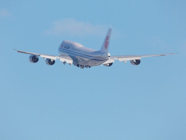 BOEING 747-8 (B-2486) - What later became the newest addition to the Air China fleet. This new Boeing 747-8 Intercontinental was still in its testing phase. It performed a missed approach at the airport. Then later a touch and go before heading back to Seattle.