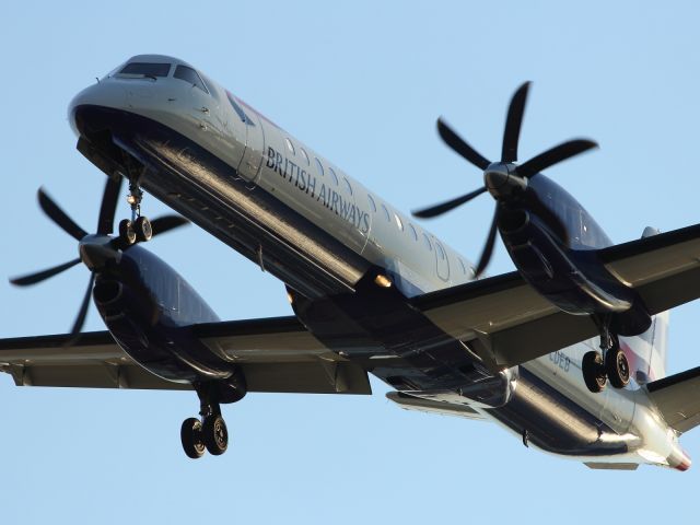 Embraer 170/175 (G-CDEB) - Catching the setting sun as it approaches London City Airport.