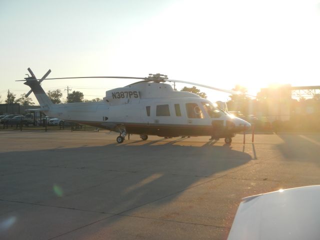 Sikorsky S-76 (N387PS) - taxing past a nice S-76C