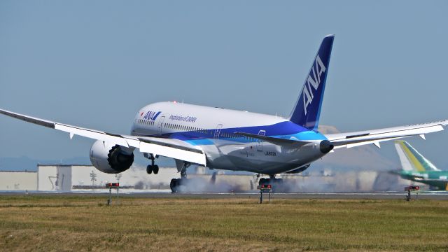 Boeing 787-8 (JA832A) - BOE138 touching down on Rwy 34L to complete its maiden flight on 8/4/14. (LN:203 / cn 42249).