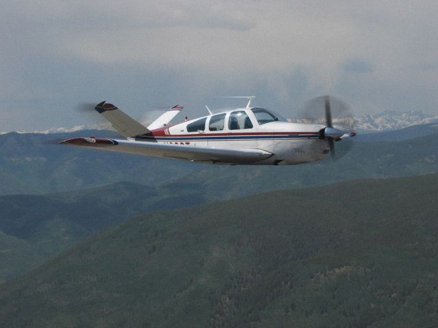 N809T — - 1978 V35B Bonanza photoshop image (photographed on ground and placed in air by Eric Bishop using Adobe Photoshop)