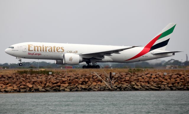 BOEING 777-200LR (A6-EFH) - Lifting Off from Rwy 34L