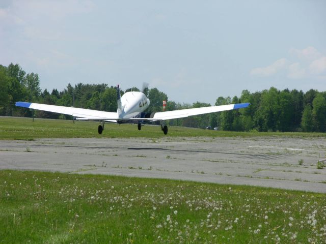 Piper Cherokee (C-FPCW) - Landing at Upper Canada Village airstrip, Ontario.