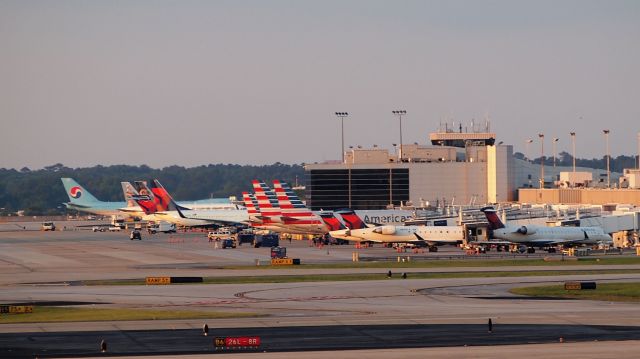— — - Concourse D.  I thought for a minute that KAL had parked here, which would have made no sense, but its a 748f on the south cargo ramp.