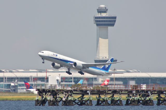 BOEING 777-300ER (JA785A) - ANA9 departs runway 22R, with the FAA tower and just a small taste of the morning International traffic.