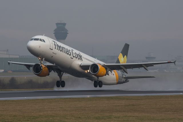 Airbus A321 (G-TCDZ) - TCX1966 leaving a murky morning in Manchester for the sunshine of Tenerife.  30 December 2016