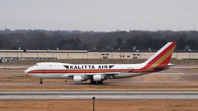 Boeing 747-400 (N706CK) - Taxiing from the south cargo ramp to 18C for departure.