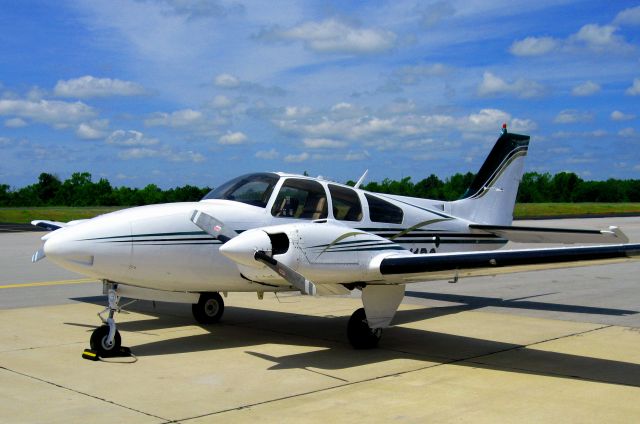 Beechcraft 55 Baron (N211DS) - Turbo Baron, by Merlyn Products, Inc.  232 KTAS