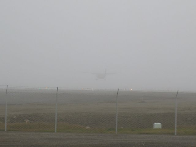 — — - Foggy landing into Barrow, Alaska.