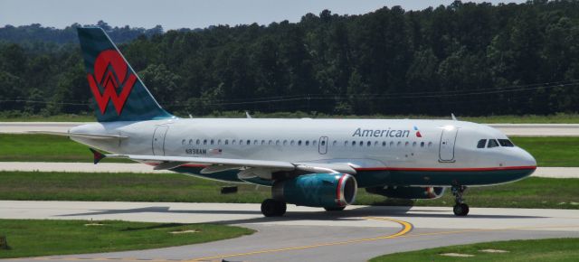 Airbus A319 (N838AW) - The America West retrojet makes a visit to RDU.