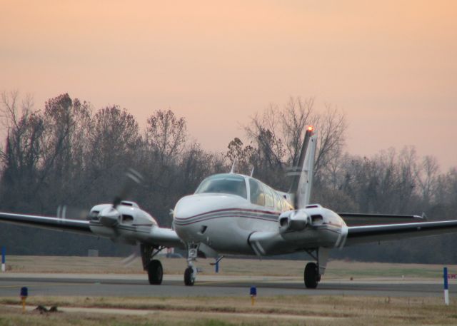 Beechcraft Baron (58) (N3711Y) - Taxiing in the early morning at Downtown Shreveport.