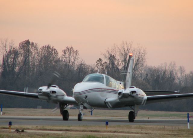 Beechcraft Baron (58) (N3711Y) - Taxiing in the early morning at Downtown Shreveport.