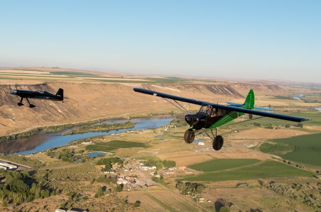 N7677M — - Formation flight south of Boise in the Snake River Canyon. Harmon Rocket III to the Left and a Javron Carbon Cub to the right. 