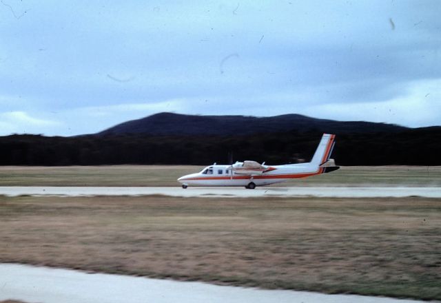 Rockwell Turbo Commander 690 (VH-EXT) - Executive Airlines Turbo Commander departing RWY 23 Flinders Island, circa 1978