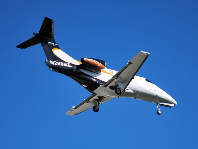 Embraer Phenom 100 (N289EE) - EMBRAER EXECUTIVE AIRCRAFT INC on final for runway 2 at KJQF - 5/25/13