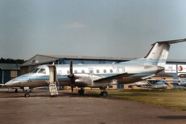 Embraer EMB-120 Brasilia (G-BRAS) - Seen here in Jun-89.br /br /Transferred to Brazil 31-Jul-89 as PT-LUS,br /reregistered N267UE in Oct-92,br /then N71GL 12-Jul-99.br /Registration cancelled 27-Oct-20.