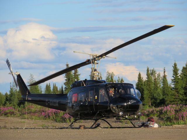 Bell UH-1V Iroquois (C-GADA) - C-GADA, an Héli-Express Bell 205 on the ramp after a day of sling work - Poste Montagnais (CSF3), July 2012