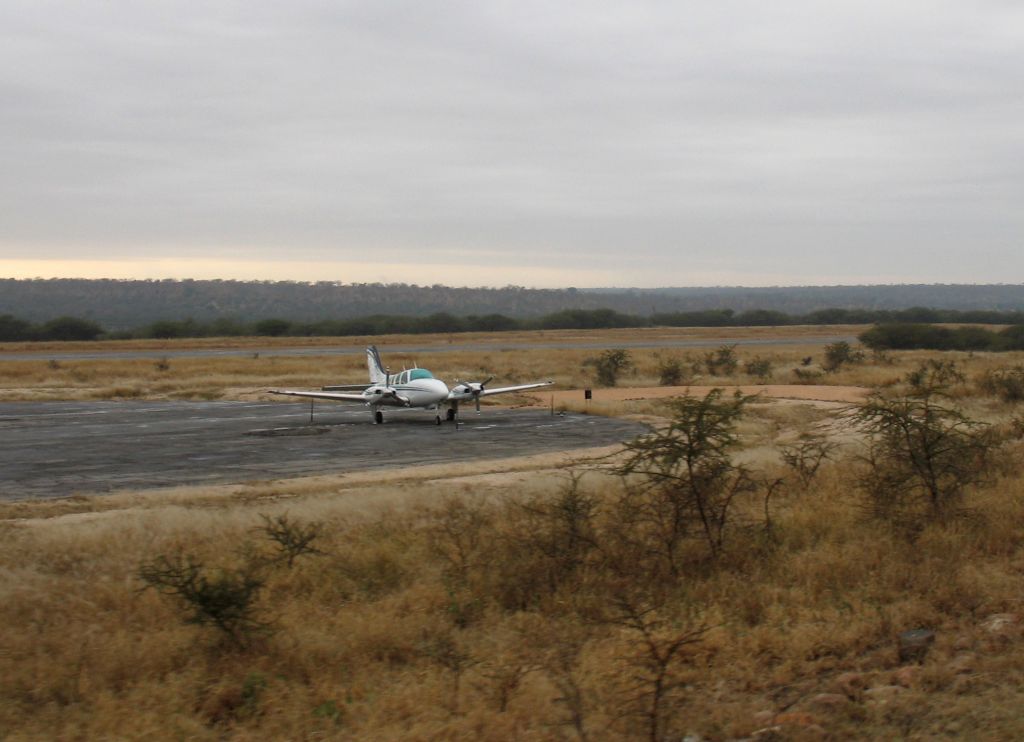 Beechcraft Baron (58) (ZS-MDJ) - At then MalaMala private game lodge, South Africa.