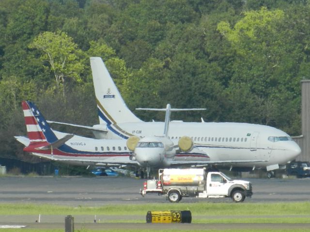 Boeing 737-200 (VP-CDA) - VP-CDA, A Boeing 737-200, Has Been Given A New Life As A Private Aircraft. VP-CDA Has Been On Sale For Over 8 Months, Until It Is Sold To A Owner, It Will Remain At Manassas Reginal Airport, Next To VP-CDA Is N334CJ, A Saab 340.