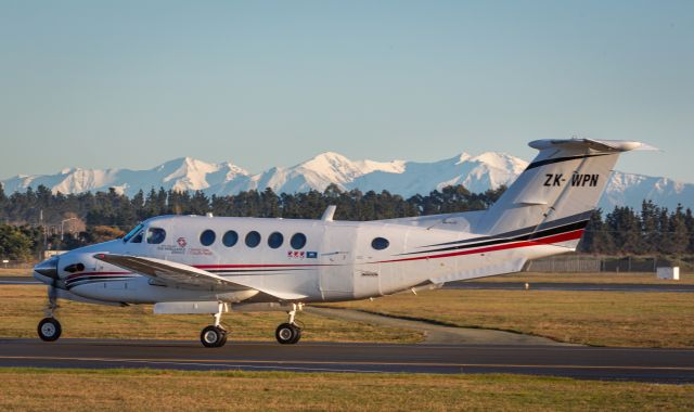 Beechcraft Super King Air 200 (ZK-WPN) - SKL4 with some fresh snow on the Southern Alps behind.