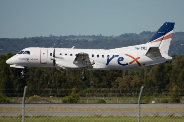 Saab 340 (VH-TRX) - About to put down on runway 05. Wednesday, 21st May 2014.