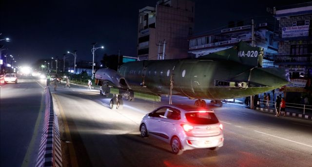 HLI748 — - Nepal army Avro plane being taxied on the busy road. It was grounded for long time and was used by King birendra. It will be showcased in Narayanhiti Museum. 