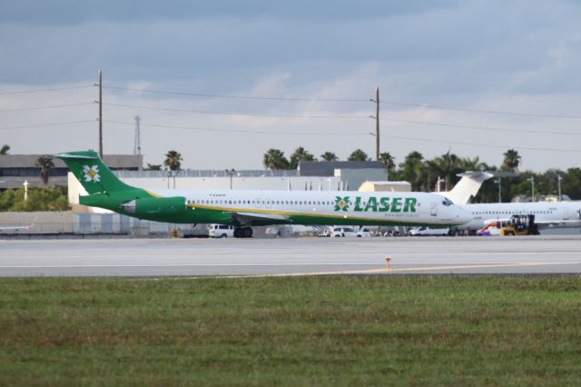 McDonnell Douglas MD-82 (YV-2945) - Not a very good photo, but I though that it was an interesting looking airplane. Operated by a company called Laser airline based out of Caracas, Venezuela. a rel=nofollow href=http://www.laserairlines.com/https://www.laserairlines.com//a I am not sure what took place in South Florida, but several chartered airplanes were taking off one after the other. One was from Germany. 