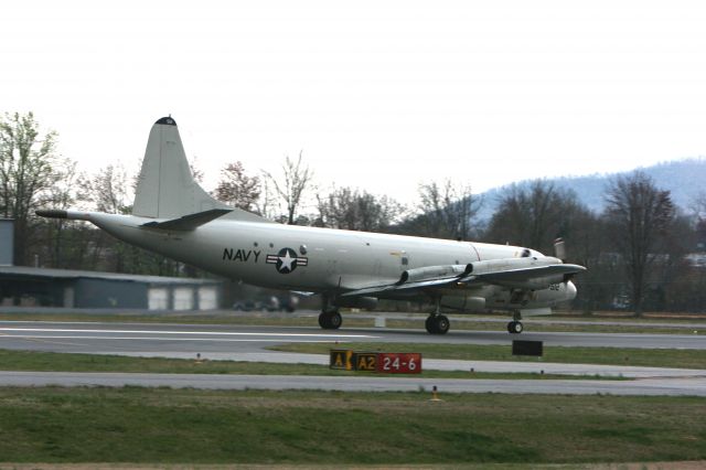 — — - P-3C Orion doing touch and gos at the Hickory Airport on 3-28-2008 at 18:19