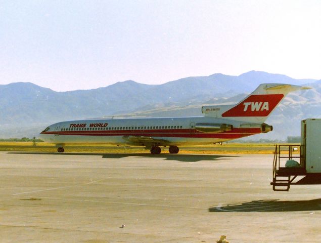 BOEING 727-200 (N84356) - KSLC - early up on a driving trip to Denver - 1988 or 89..a quick trip through the SLC terminal caught this TWA 727 headed for the main north-south departure runway for a probable trip to KSTL/STL St Louis MO. There was a Pan Am 727 and a Hawaiian Air DC-8 here getting ready to roll also..........if only I had more time!