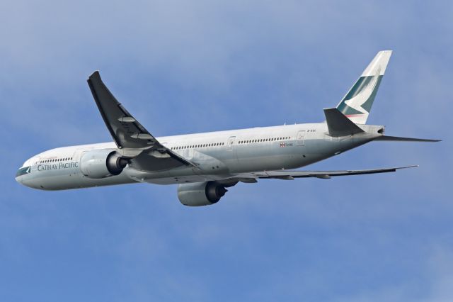 BOEING 777-300ER (B-KQC) - Blue skies appeared at last.  CPA358 departing to HKG