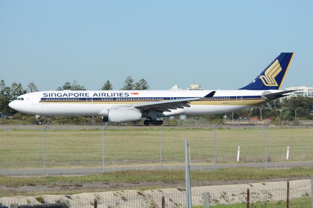 Airbus A330-300 (9V-STY) - Turning from taxiway on to runway 05, for take-off for flight home to Singapore. Wednesday, 21st May 2014.