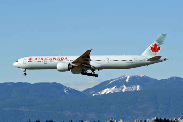 BOEING 777-300 (C-FNNU) - New addition to the AC fleet. Delivered to AC 2013-12-19. In the background is Cypress Mountain ski area.